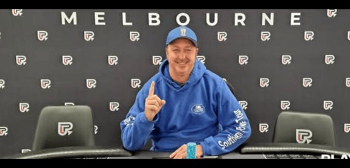 Chris Skinner at the poker table celebrating a win in Melbourne before being caught for cheating