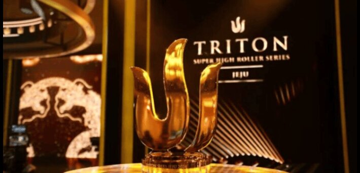Triton High Roller trophy with Triton logo in the background