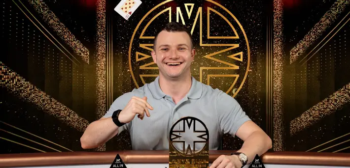 Alex Kulev holds the trophy after winning the $10,000 Onyx High Roller Series opener at Merit Royal Diamond Casino Cyprus for $384,150 in February 2026